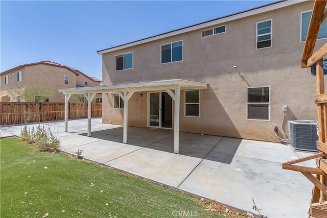 3720 Mount Whitney Ave, Rosamond, CA 93560 - rear view of property with stucco siding and a patio area