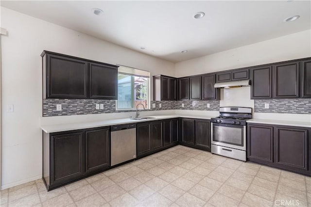 3720 Mount Whitney Ave, Rosamond, CA 93560 - kitchen featuring stainless steel appliances, under cabinet range hood, light countertops, and recessed lighting