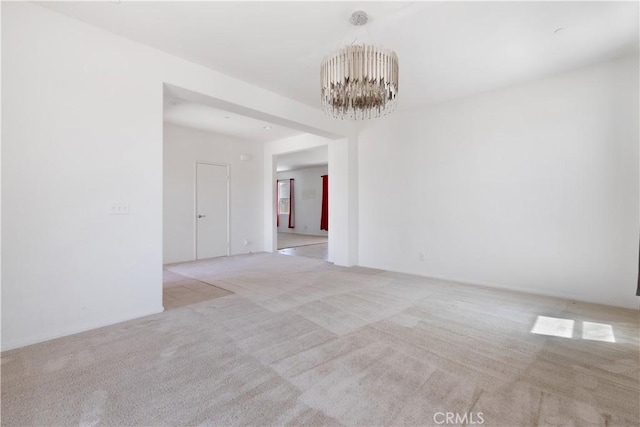 3720 Mount Whitney Ave, Rosamond, CA 93560 - carpeted empty room featuring a chandelier