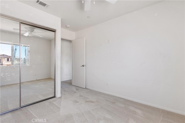 3720 Mount Whitney Ave, Rosamond, CA 93560 - unfurnished bedroom featuring carpet, a ceiling fan, and a closet