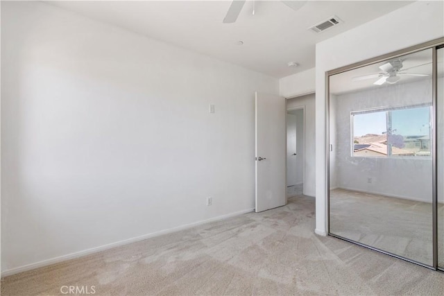 3720 Mount Whitney Ave, Rosamond, CA 93560 - unfurnished bedroom featuring light colored carpet, a closet, and ceiling fan