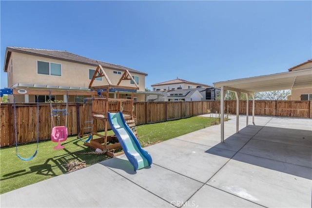3720 Mount Whitney Ave, Rosamond, CA 93560 - fenced backyard featuring a playground and a patio area