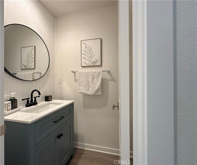 4173 Horvath St Unit 104, Corona, CA 92883 - bathroom featuring wood finished floors and vanity
