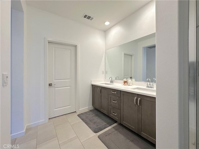4173 Horvath St Unit 104, Corona, CA 92883 - full bathroom featuring tile patterned flooring and double vanity