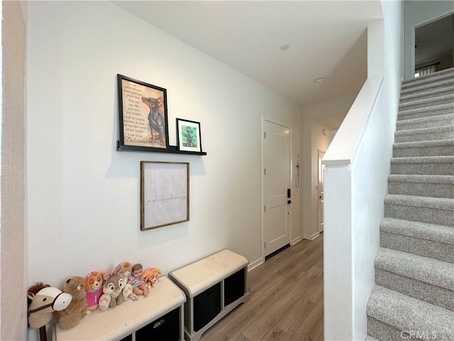 4173 Horvath St Unit 104, Corona, CA 92883 - stairway with wood finished floors and baseboards