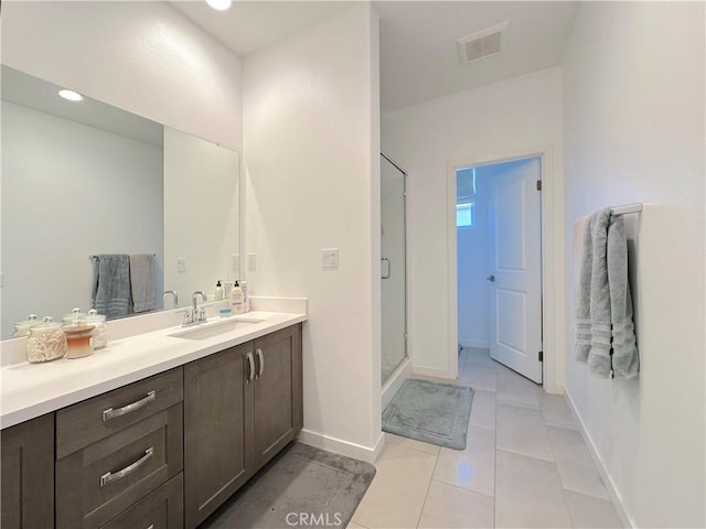 4173 Horvath St Unit 104, Corona, CA 92883 - full bath with vanity, a stall shower, and tile patterned floors