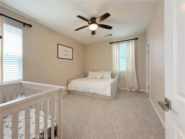 4173 Horvath St Unit 104, Corona, CA 92883 - carpeted bedroom featuring baseboards and ceiling fan