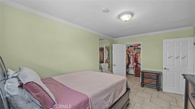 3856 Baldwin Park Blvd Unit B, Baldwin Park, CA 91706 - bedroom featuring ornamental molding, a walk in closet, and a closet