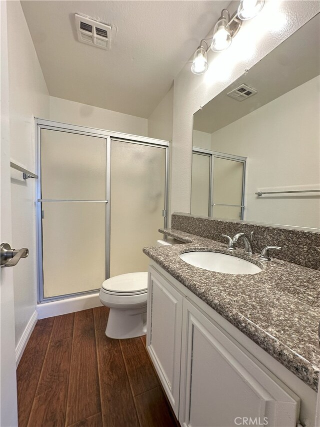 16144 Crystal Creek Ln, Cerritos, CA 90703 - full bathroom with wood finished floors, vanity, and a stall shower