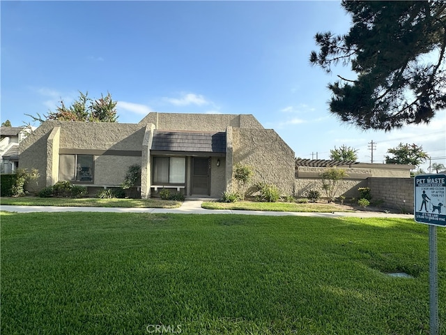 16144 Crystal Creek Ln, Cerritos, CA 90703 - view of front of property with a front lawn and stucco siding