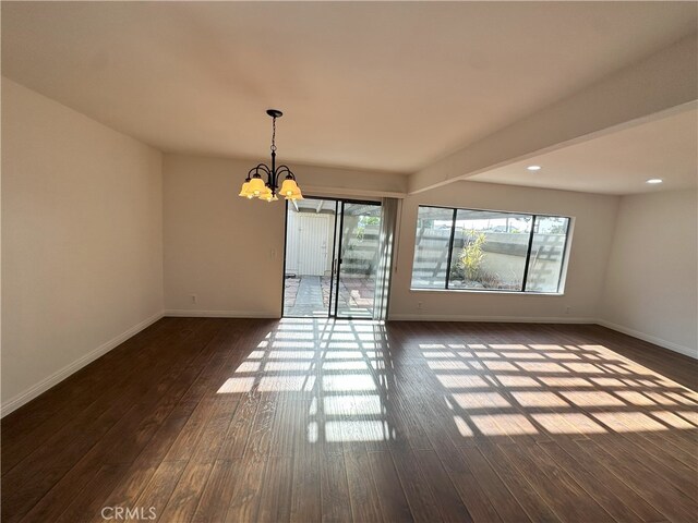 16144 Crystal Creek Ln, Cerritos, CA 90703 - spare room with a chandelier, dark wood-style floors, and recessed lighting