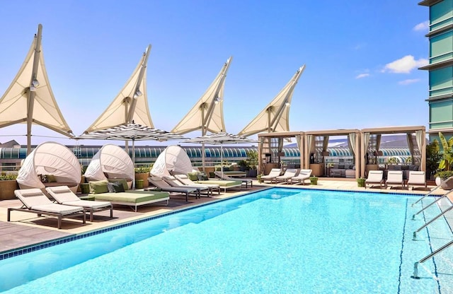 165 6th Ave Unit 2504, San Diego, CA 92101 - community pool featuring a patio and an outdoor living space