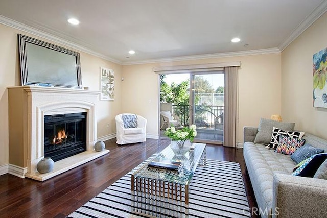 1417 S Westgate Ave Unit 201, Los Angeles, CA 90025 - living room with wood finished floors, ornamental molding, a glass covered fireplace, and recessed lighting