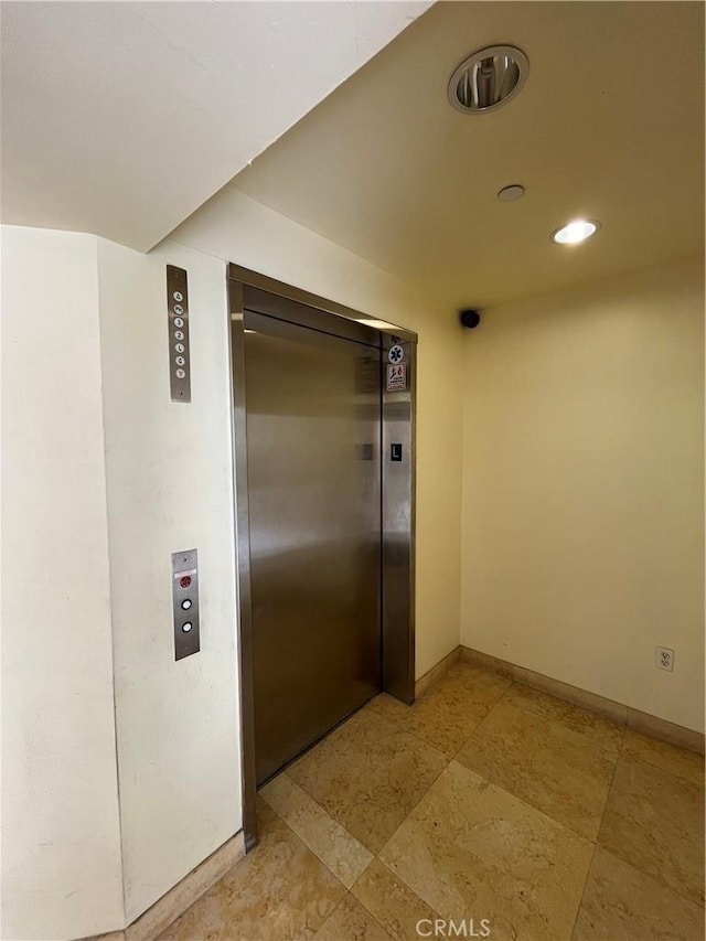 1417 S Westgate Ave Unit 201, Los Angeles, CA 90025 - hall with elevator and recessed lighting