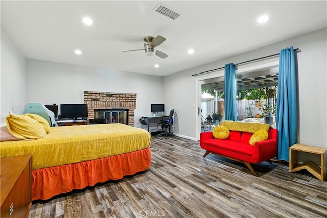 3101 Maple Ave, Fullerton, CA 92835 - bedroom with wood finished floors, access to outside, recessed lighting, an office area, and a brick fireplace