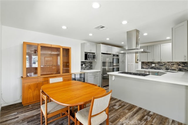 3101 Maple Ave, Fullerton, CA 92835 - dining area featuring dark wood-type flooring and recessed lighting