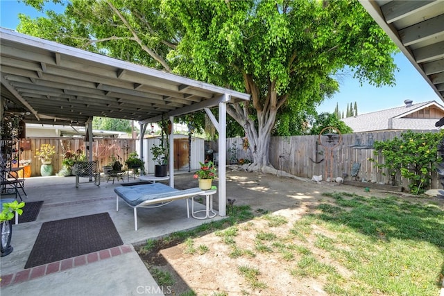 3101 Maple Ave, Fullerton, CA 92835 - fenced backyard featuring a storage unit and a patio area