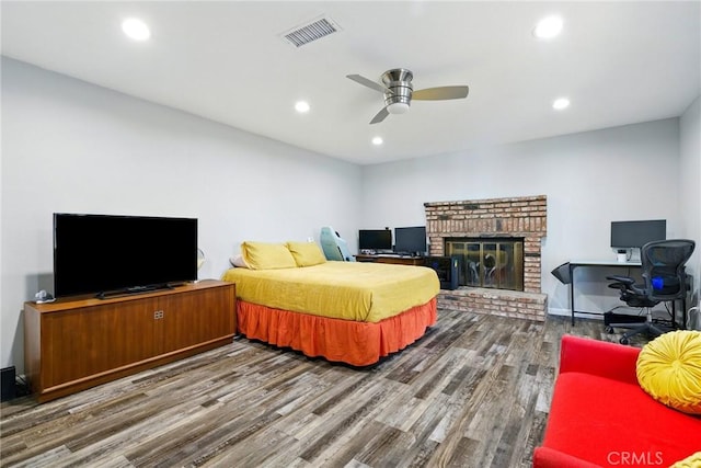 3101 Maple Ave, Fullerton, CA 92835 - bedroom with wood finished floors, a fireplace, recessed lighting, ceiling fan, and an office area