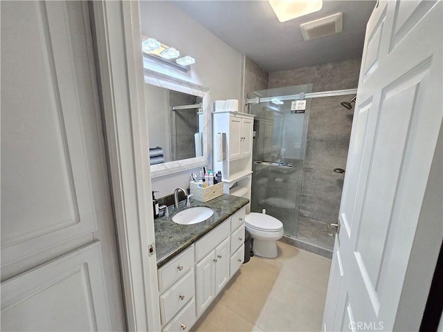 612 N Columbus Ave Unit 101, Glendale, CA 91203 - full bath featuring tile patterned floors, a stall shower, and vanity