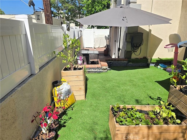 612 N Columbus Ave Unit 101, Glendale, CA 91203 - view of yard featuring a vegetable garden