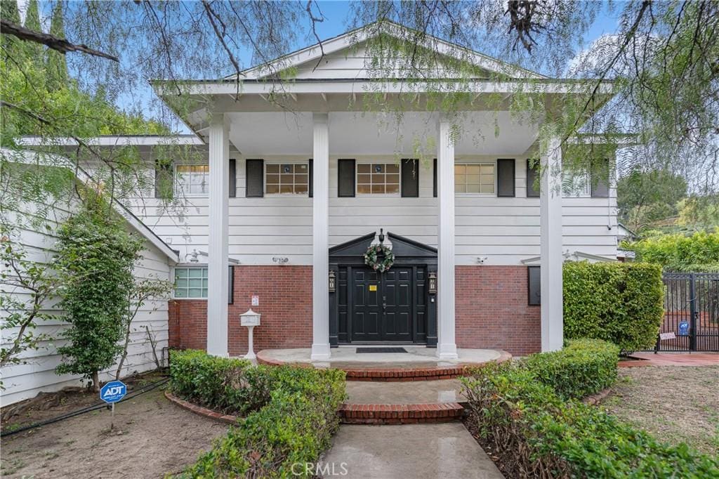 3136 Dona Sofia Dr, Studio City, CA 91604 - greek revival inspired property featuring brick siding and covered porch