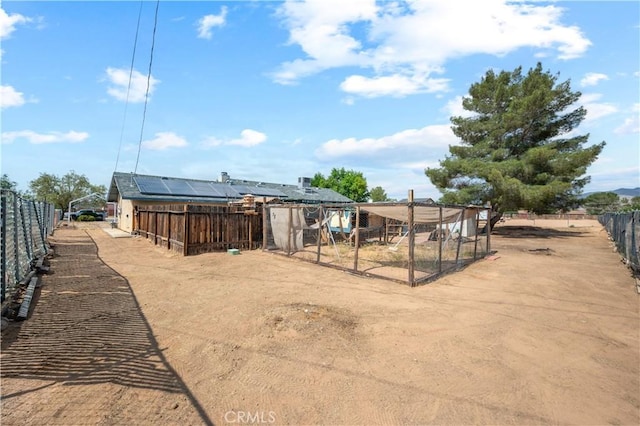 14551 Jelan Ave, Apple Valley, CA 92307 - view of yard featuring exterior structure and an outdoor structure