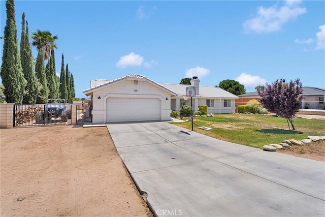 7733 Pismo Ave, Hesperia, CA 92345 - view of front of house featuring a garage, concrete driveway, a gate, and stucco siding