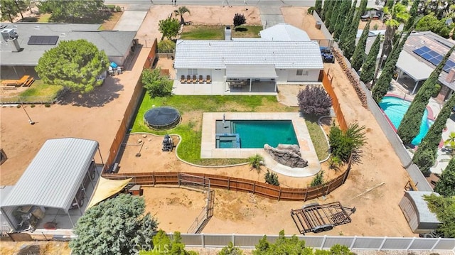 7733 Pismo Ave, Hesperia, CA 92345 - aerial view of property and surrounding area with a pool