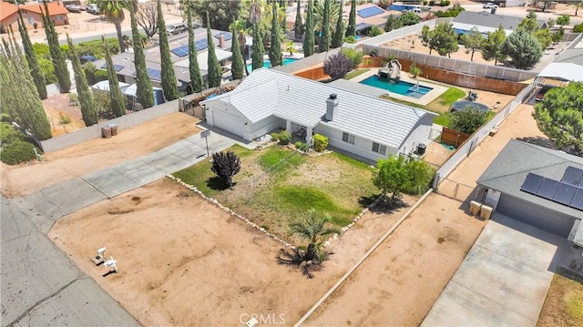7733 Pismo Ave, Hesperia, CA 92345 - aerial perspective of suburban area with a pool area