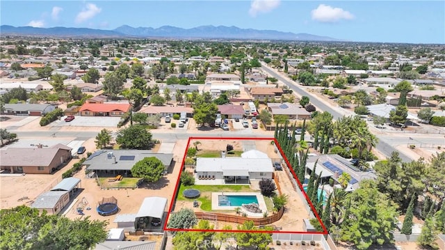 7733 Pismo Ave, Hesperia, CA 92345 - aerial perspective of suburban area with a mountain backdrop and property parcel outlined