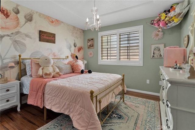 7733 Pismo Ave, Hesperia, CA 92345 - bedroom with dark wood-style flooring and a chandelier