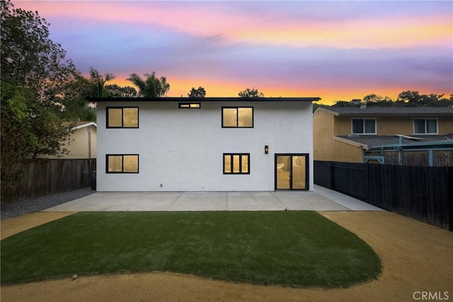 4282 Robbins St, San Diego, CA 92122 - back of house featuring a fenced backyard, a patio, and stucco siding