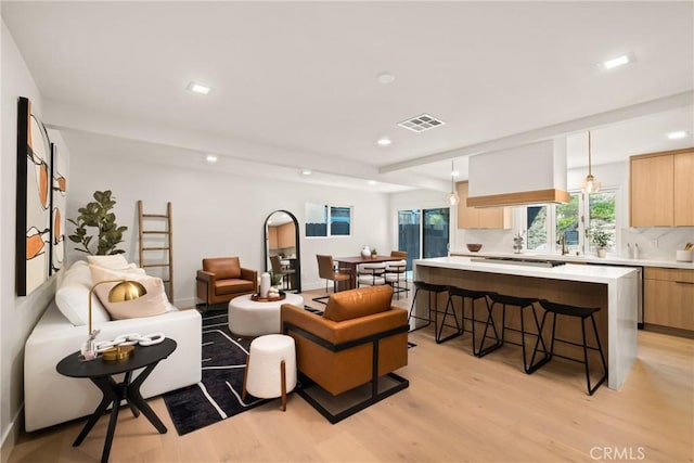 4282 Robbins St, San Diego, CA 92122 - living room featuring light wood-style floors and recessed lighting