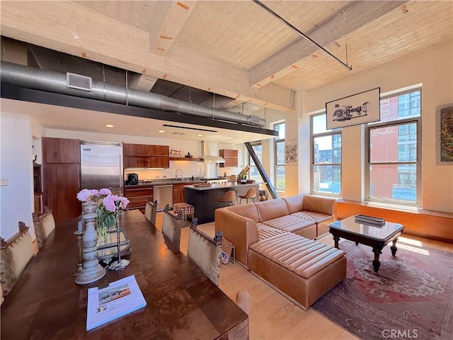 207 Broadway E Unit 302, Long Beach, CA 90802 - living area featuring dark wood-style floors and a towering ceiling