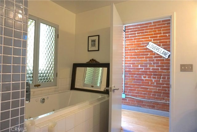 207 Broadway E Unit 302, Long Beach, CA 90802 - full bathroom with a jetted tub and wood finished floors