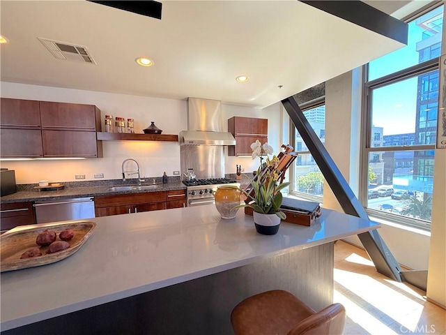 207 Broadway E Unit 302, Long Beach, CA 90802 - kitchen featuring wall chimney range hood, stainless steel appliances, open shelves, dark countertops, and recessed lighting