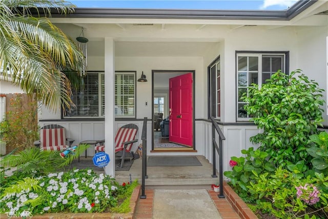 1050 Marvista Ave, Seal Beach, CA 90740 - view of exterior entry featuring a porch and stucco siding