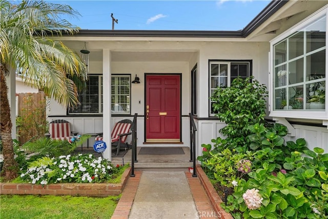 1050 Marvista Ave, Seal Beach, CA 90740 - property entrance with stucco siding and a porch
