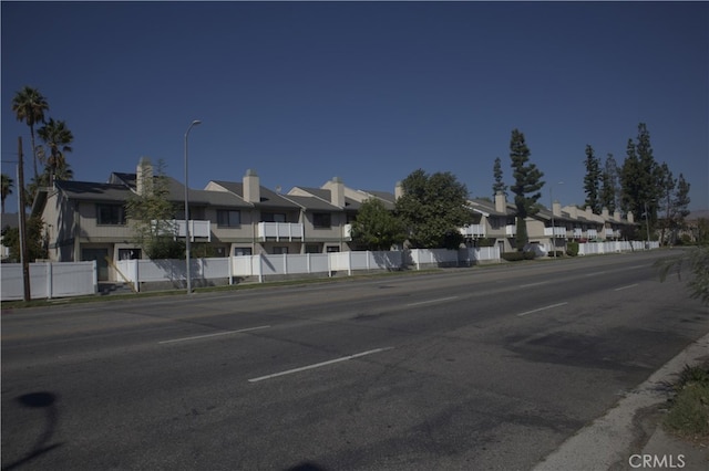 8341 De Soto Ave Unit 10, Canoga Park, CA 91304 - view of property featuring a residential view and uncovered parking