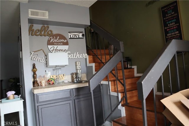 8341 De Soto Ave Unit 10, Canoga Park, CA 91304 - stairway with wood finished floors