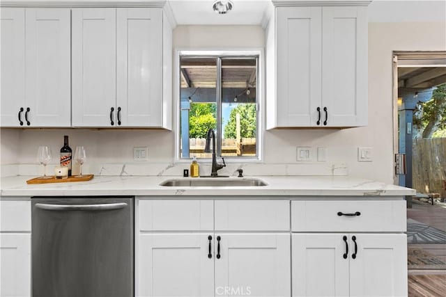 5655 Clearwater Dr, Yorba Linda, CA 92887 - kitchen with stainless steel dishwasher, white cabinetry, and light stone countertops