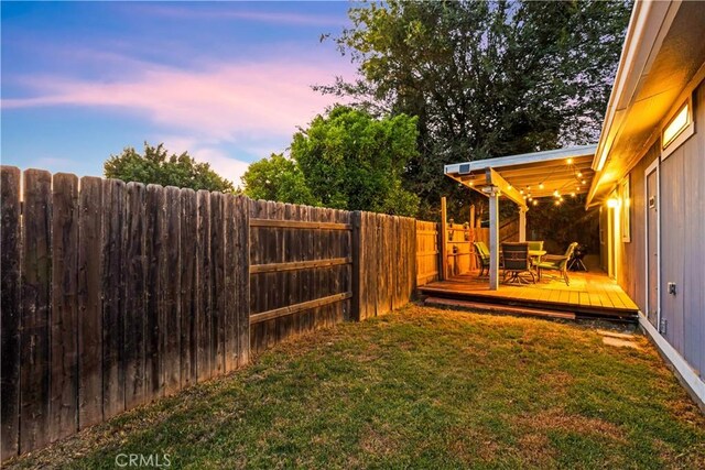 5655 Clearwater Dr, Yorba Linda, CA 92887 - yard at dusk with a fenced backyard and a wooden deck