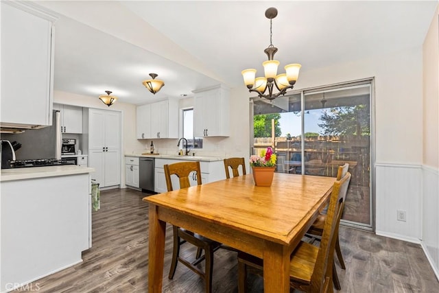 5655 Clearwater Dr, Yorba Linda, CA 92887 - dining space with a chandelier, dark wood-type flooring, and a wainscoted wall