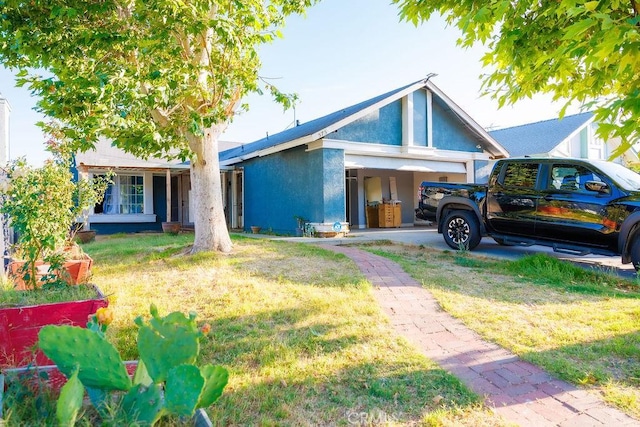 575 Prairie Way, Perris, CA 92571 - view of front of house featuring a front lawn, stucco siding, and an attached garage