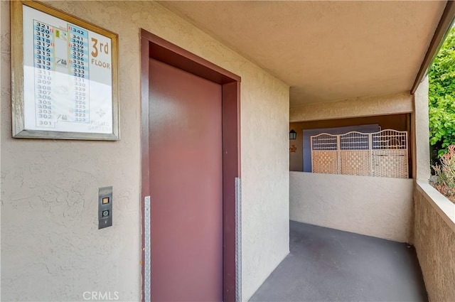 2501 W Redondo Beach Blvd Unit 306, Gardena, CA 90249 - doorway to property with stucco siding and a balcony