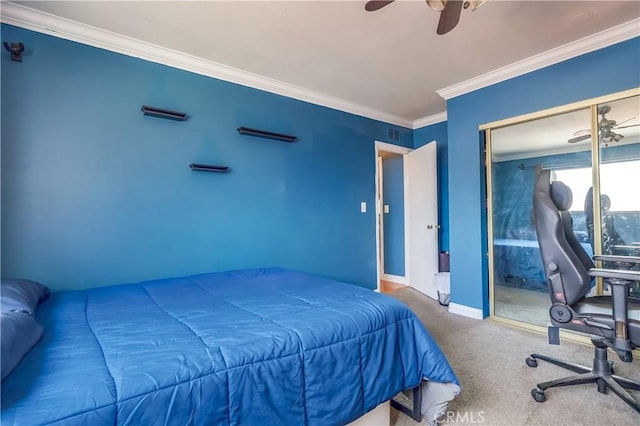 2501 W Redondo Beach Blvd Unit 306, Gardena, CA 90249 - bedroom with carpet flooring, ornamental molding, a ceiling fan, and a closet