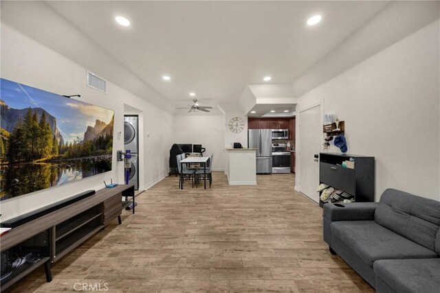 22709 Lakeway Dr Unit 493, Diamond Bar, CA 91765 - living area featuring stacked washer and clothes dryer, recessed lighting, light wood-type flooring, and a ceiling fan