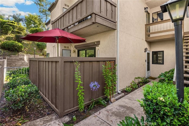 22709 Lakeway Dr Unit 493, Diamond Bar, CA 91765 - view of home's exterior featuring stucco siding and a balcony