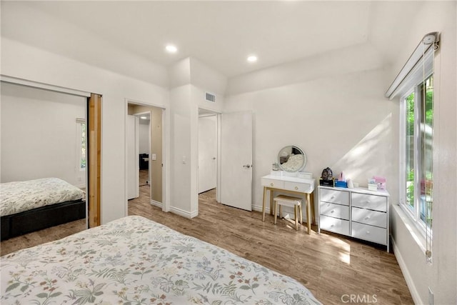 22709 Lakeway Dr Unit 493, Diamond Bar, CA 91765 - bedroom with multiple windows, wood finished floors, and recessed lighting