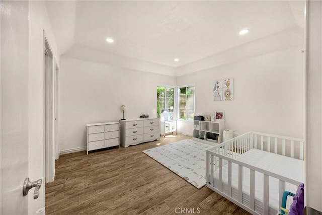 22709 Lakeway Dr Unit 493, Diamond Bar, CA 91765 - bedroom with wood finished floors, recessed lighting, and a nursery area